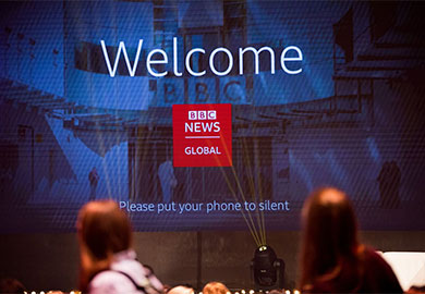 BBC welcome logo projected onto a stage 