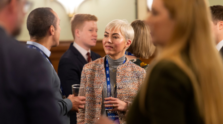IAB members in discussion at a parliamentary event
