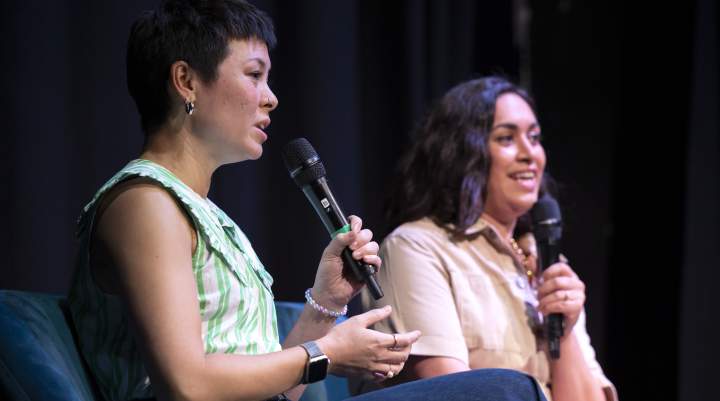 Two women presenting at an event