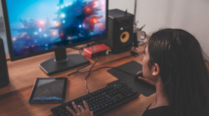 girl playing a computer game