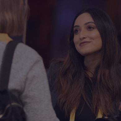 Woman talking to another woman