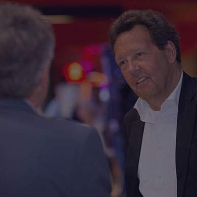 two middle aged gentlemen conversing