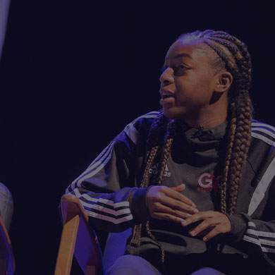 woman with dreads chatting