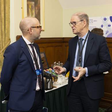 Two men engaged in conversation