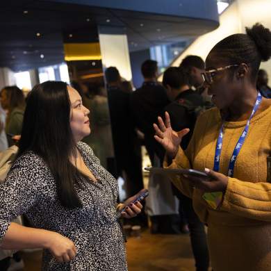 two women talking at Engage 2024