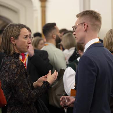 members chatting at IAB event