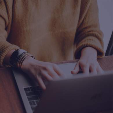 A person typing on a keyboard