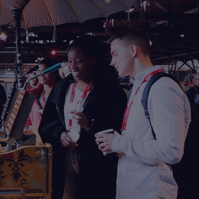 Stock image of people talking at networking event