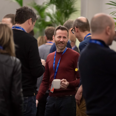 IAB Members talking at an event