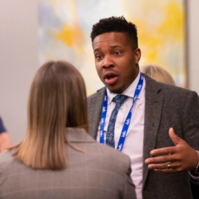 IAB UK member in conversation at an event