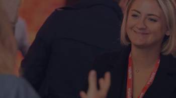 a stock photo of a blonde lady looking pleased