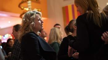 members engaged in conversation