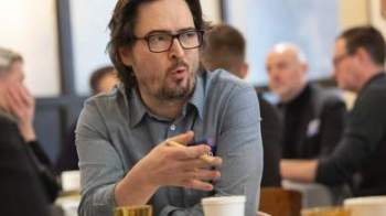 Man in conversation