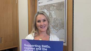 Caroline Dinenage, MP for Gosport, holding up IAB UK pledge