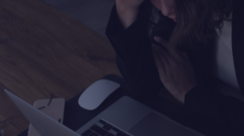 Stressed out person at a computer