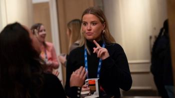 Person in conversation at IAB event