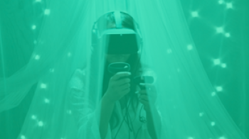 Woman gaming via virtual reality headset