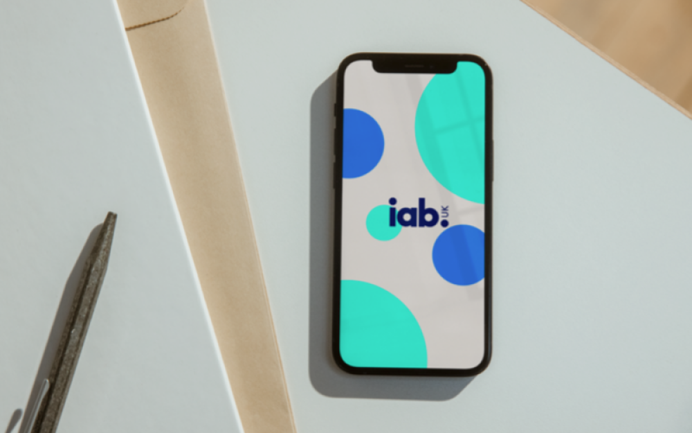 phone screen with iab branding
