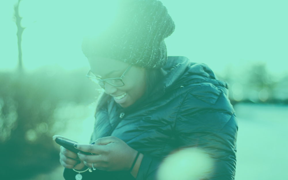 Woman using smartphone outdoors