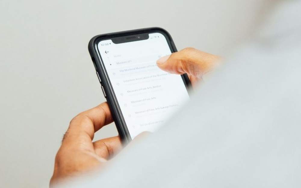 person using iPhone
